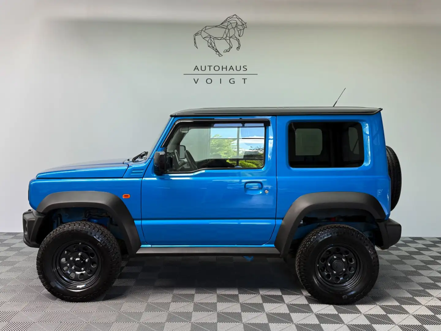 Suzuki Jimny Comfort+ AllGrip|1.Hand|LED|AHK|Höherleg.| Modrá - 1
