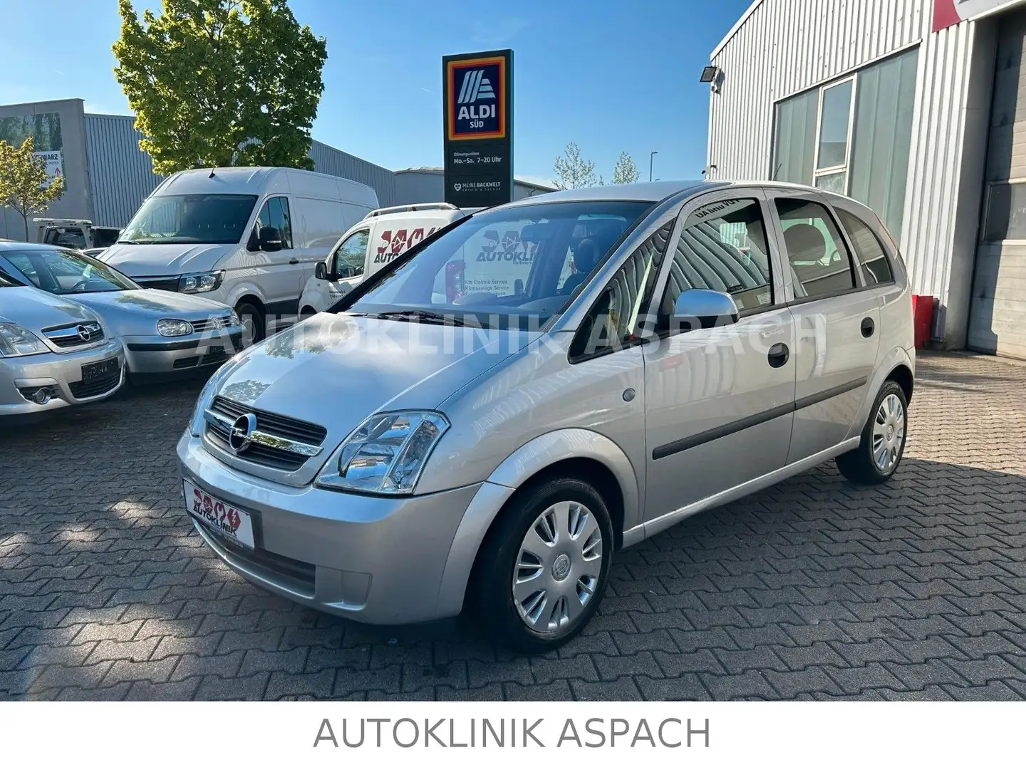 Opel Meriva 1.6 Enjoy 74kW * TÜV NEU * KLIMA * PDC * Silber - 1