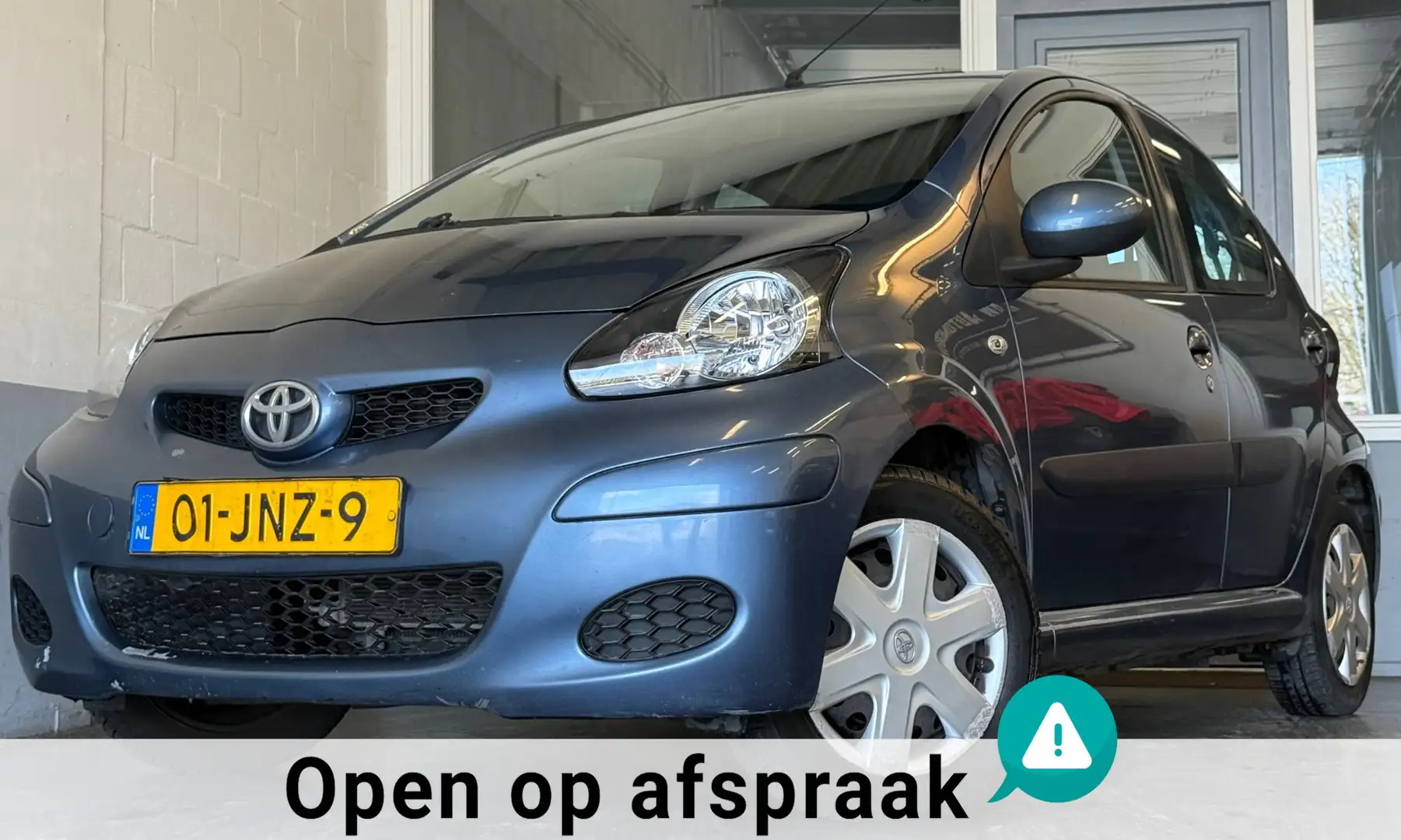Toyota Aygo 1.0-12V Comfort|NAP|APK09-26|Airco|5Deurs|Elekrame Blau - 1