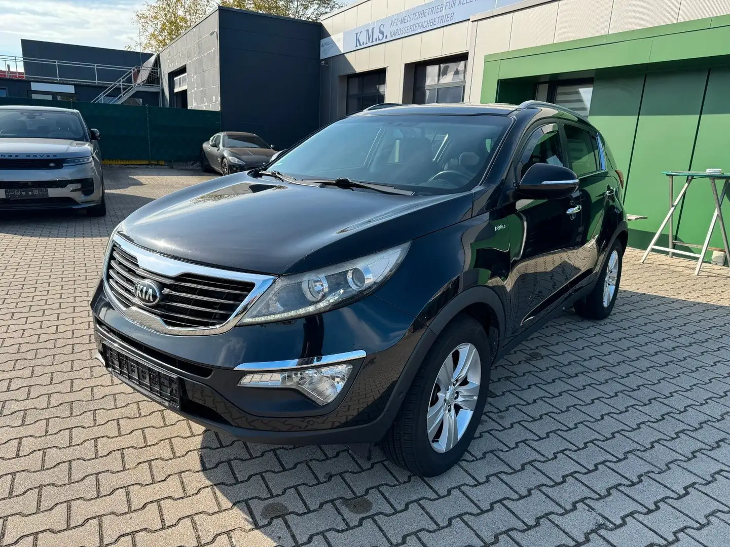 Kia Sportage 4WD*Kamera*4xSitzheizung*AHK*Tempomat Schwarz - 1