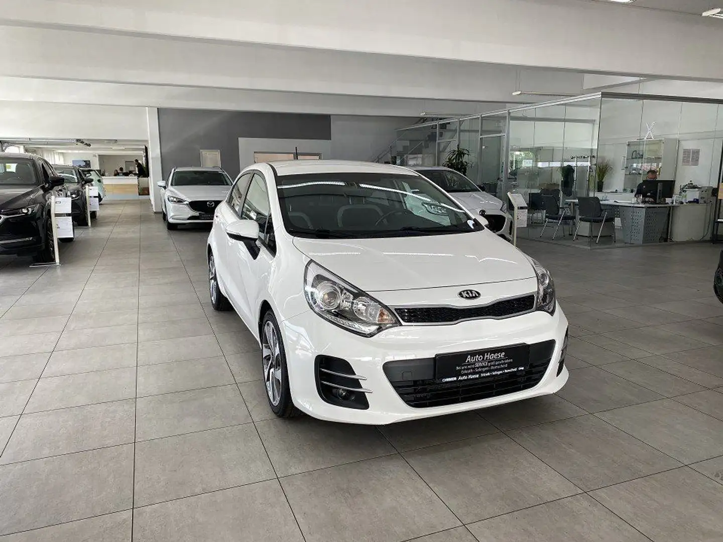 Kia Rio 1.2 84PS Spirit Klima,Pdc,Shz Weiß - 1