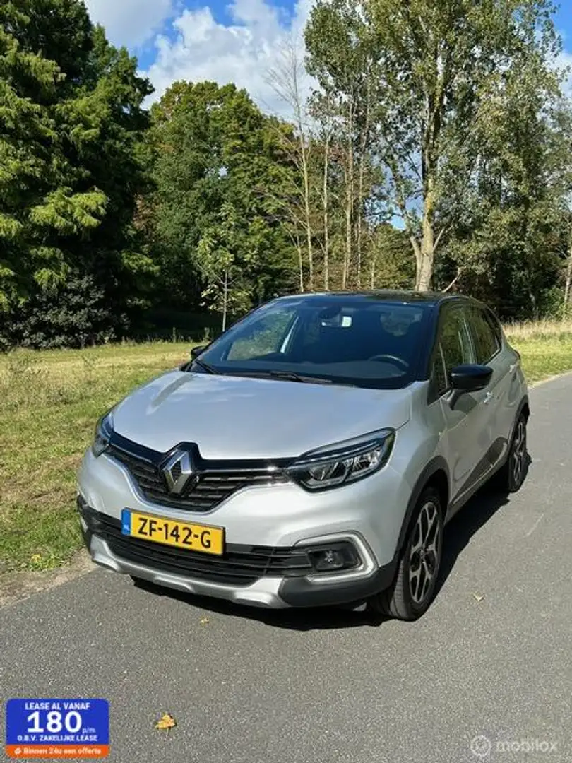 Renault Captur 1.2 TCe Intens Automaat, trekhaak, airco Grijs - 1