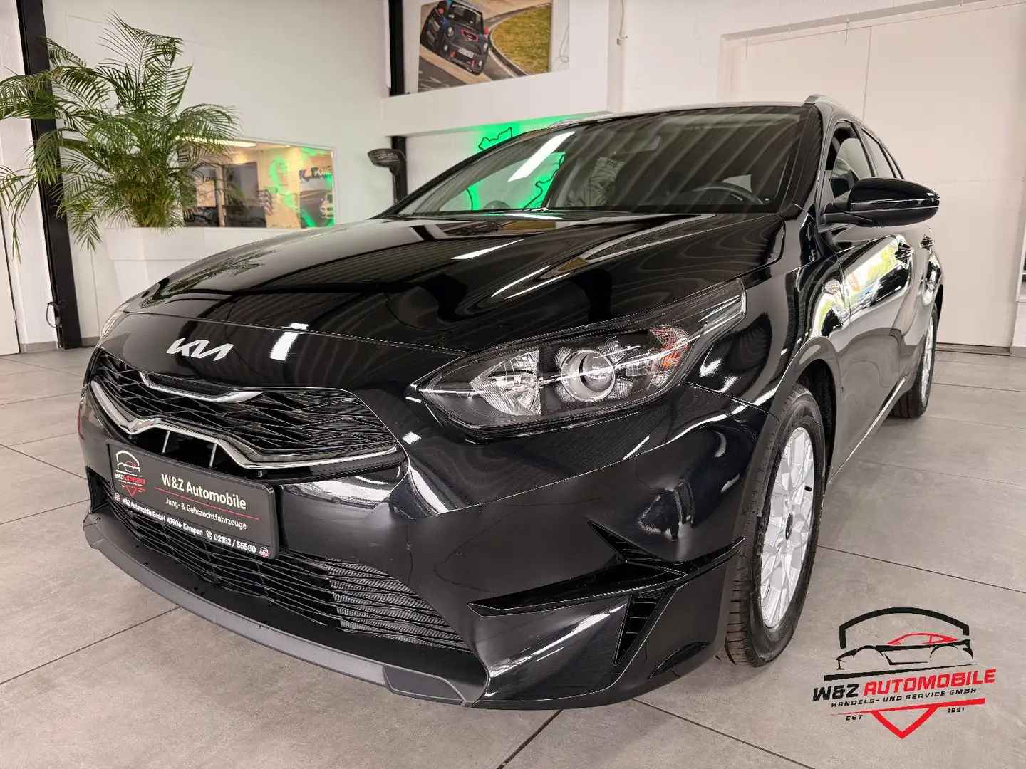 Kia Ceed SW / cee'd SW Ceed 1.0 T.GDI Kombi +Navi+SHZ+Kamera+PDC+ Schwarz - 1