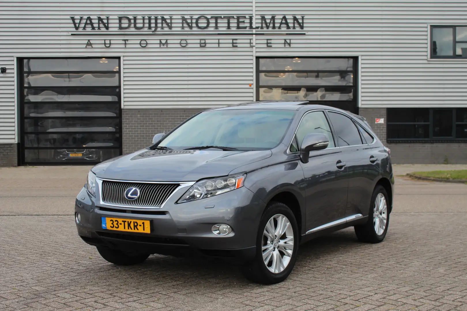 Lexus RX 450h 4WD High Edition / Schuifdak / HUD / N.A.P. Gris - 1