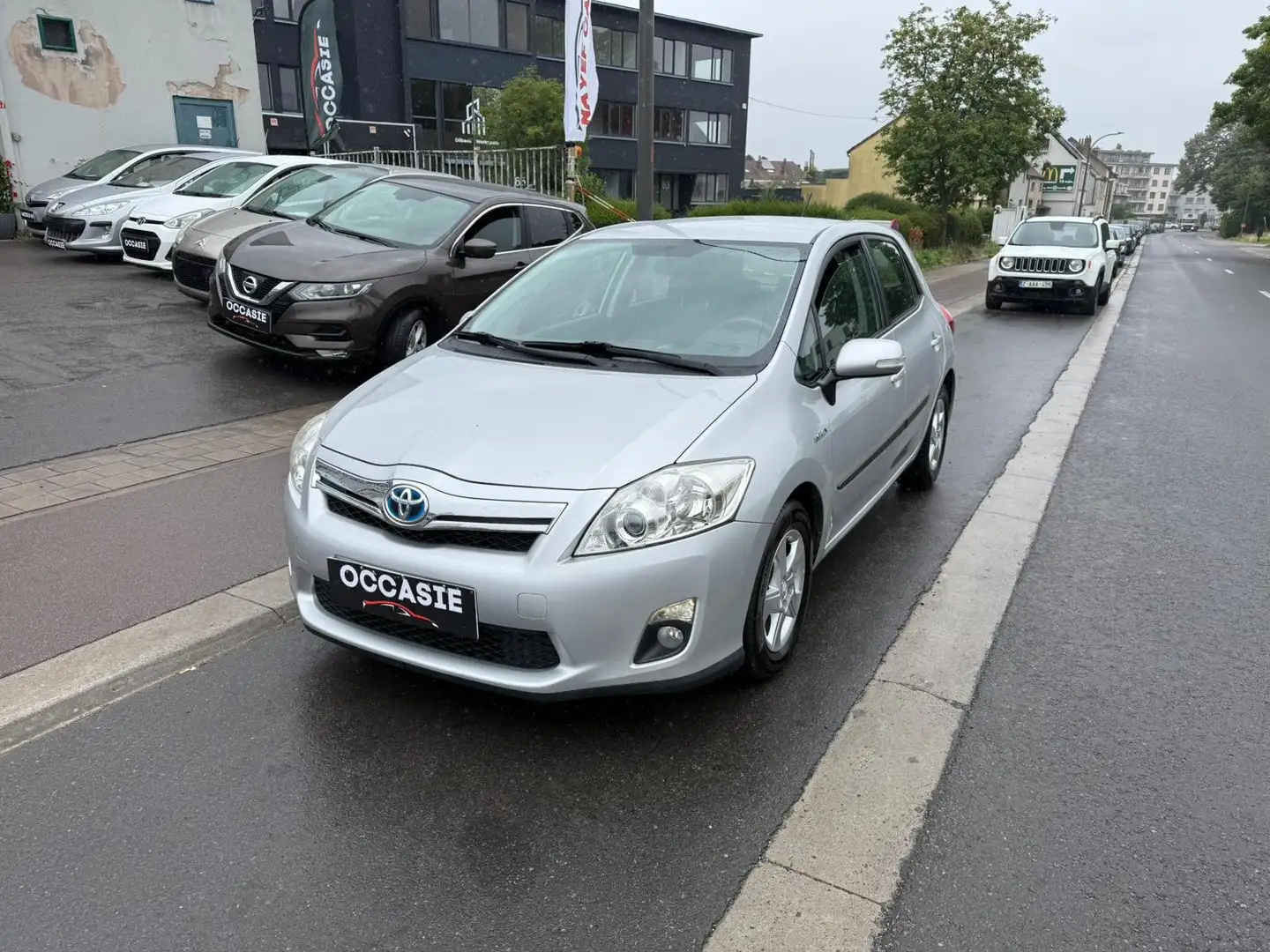 Toyota Auris HEV 1.8i HSD Luna **12M GARANTIE**CARNET COMPLET** Gris - 1