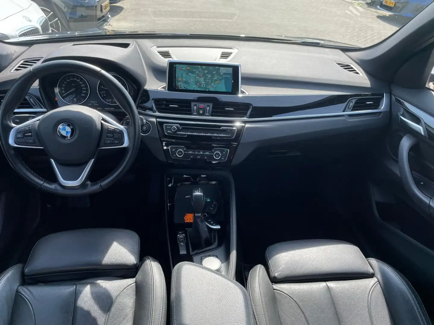 BMW X1 sDrive20i High Executive / Trekhaak / Head-up / Le Noir - 2