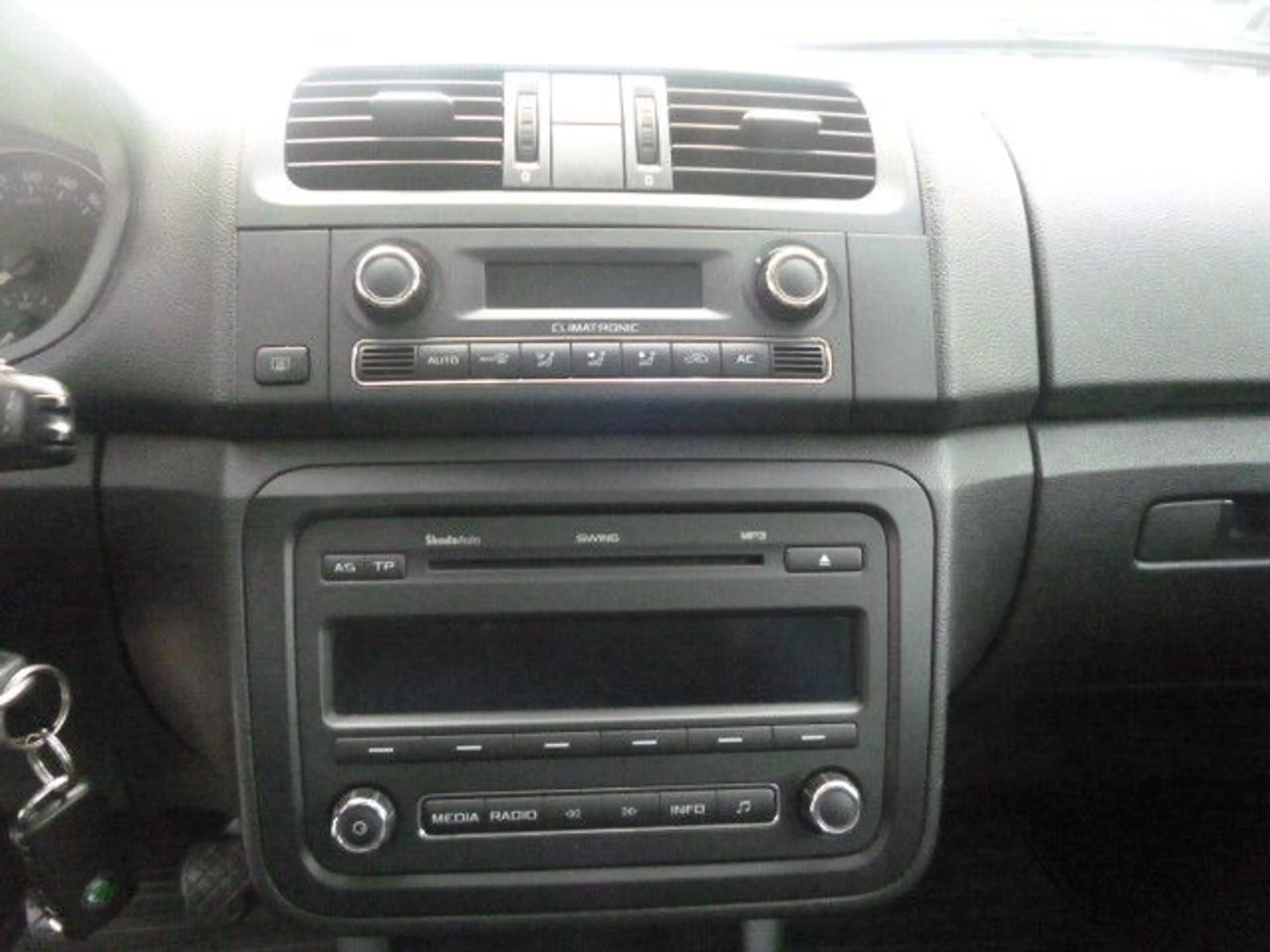 Skoda Roomster 1.2 Comfort Plus — photo 12