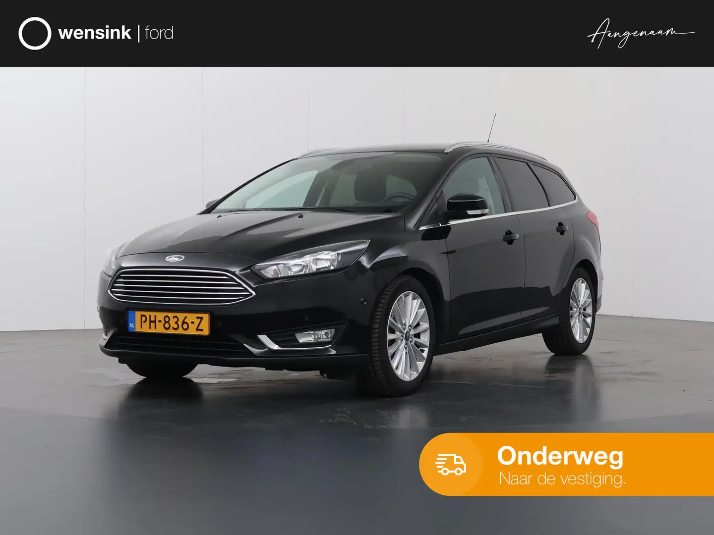 Ford Focus Wagon 1.0 Titanium | Trekhaak | Navigatie | Voorru Zwart - 1