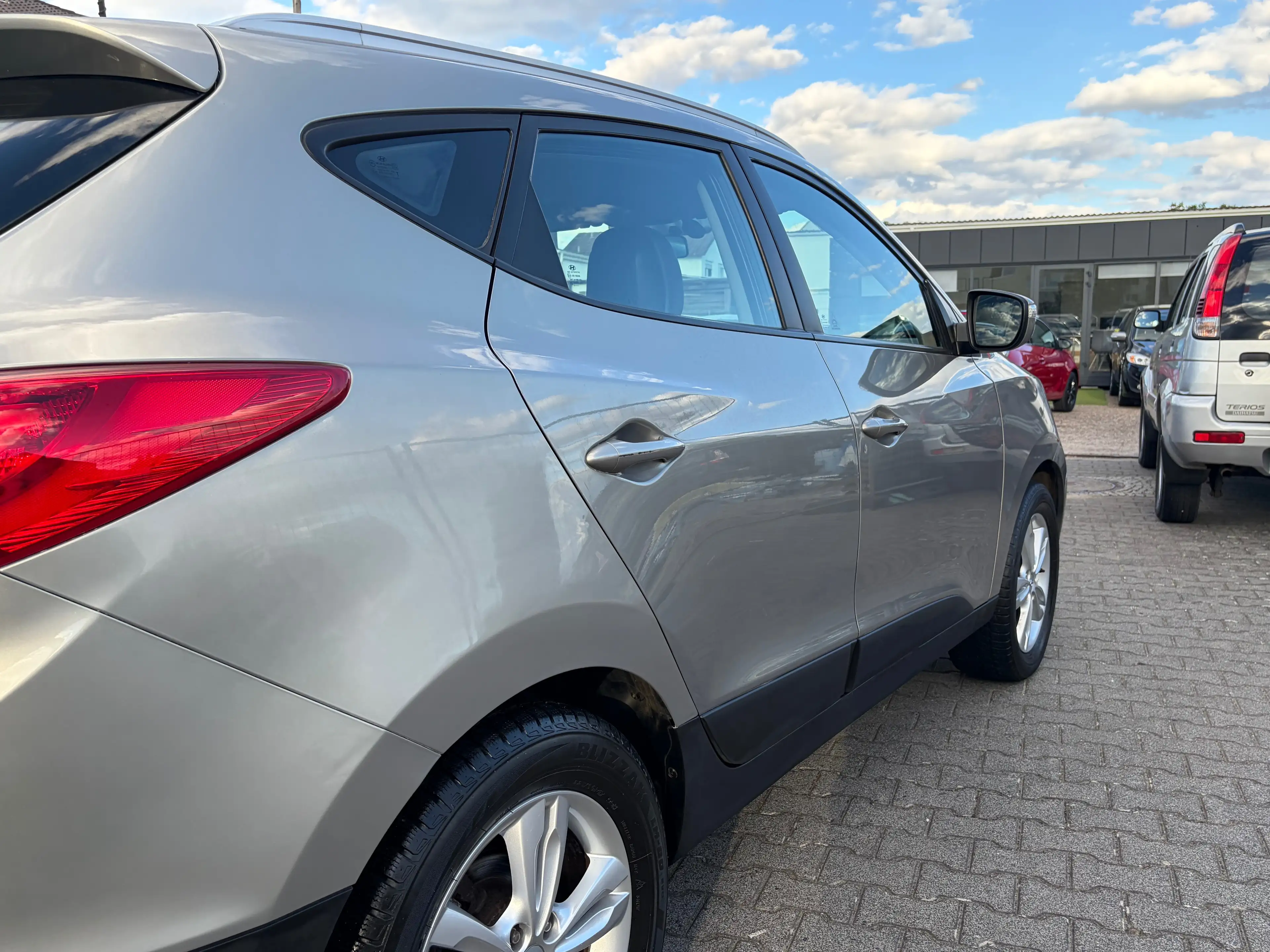 Hyundai iX35 Style 2WD*Automatik*HU/AU Neu*T.Leder* — photo 12