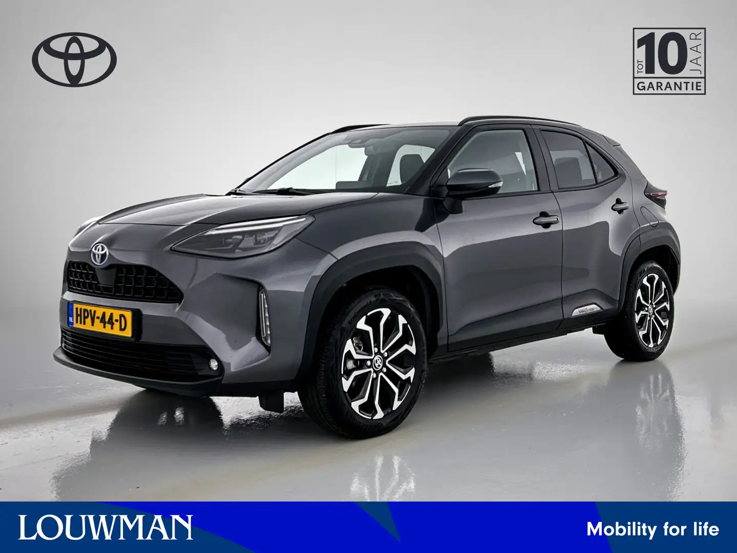 Toyota Yaris Cross 1.5 Hybrid Dynamic Limited | LM velgen | Navigatie Grijs - 1
