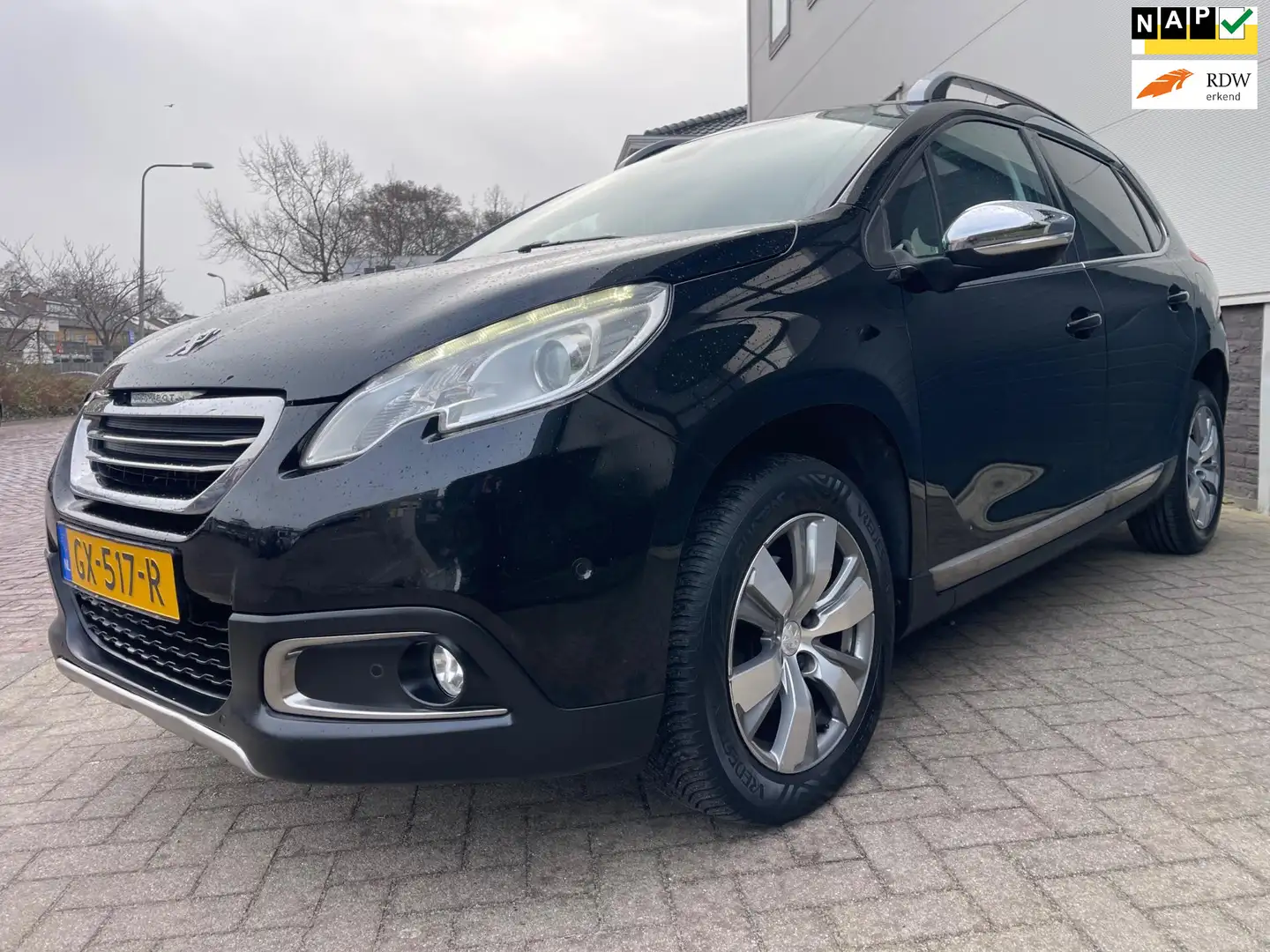 Peugeot 2008 1.2 PureTech Allure/Pano/parkeerassistent/Navi/Cli Noir - 1