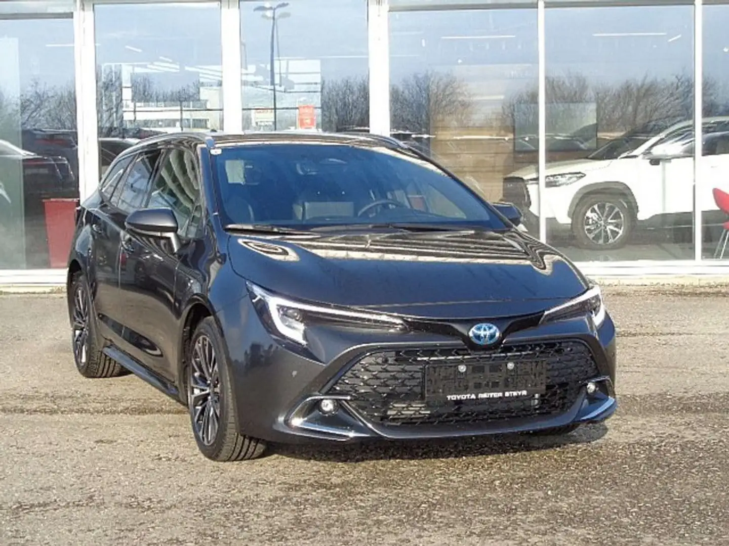 Toyota Corolla 1,8 Hybrid Touring Sports Teamplayer Grau - 1