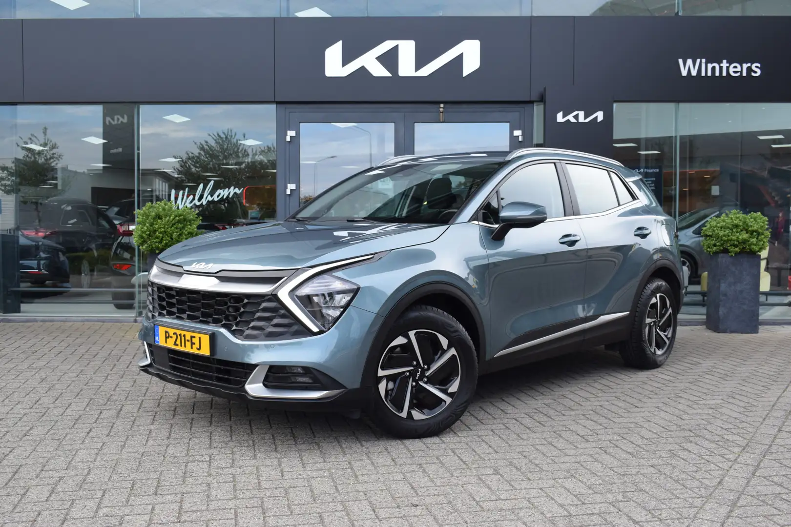 Kia Sportage 1.6 T-GDi Hybrid DynamicLine DCT6/Autom. | Cruise Grijs - 1