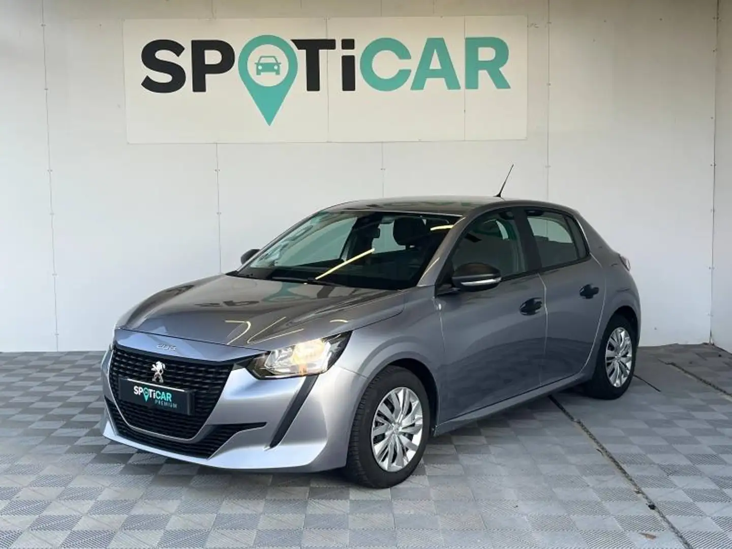 Peugeot e-208 1.2 PureTech 75ch S\u0026S Like Grijs - 1