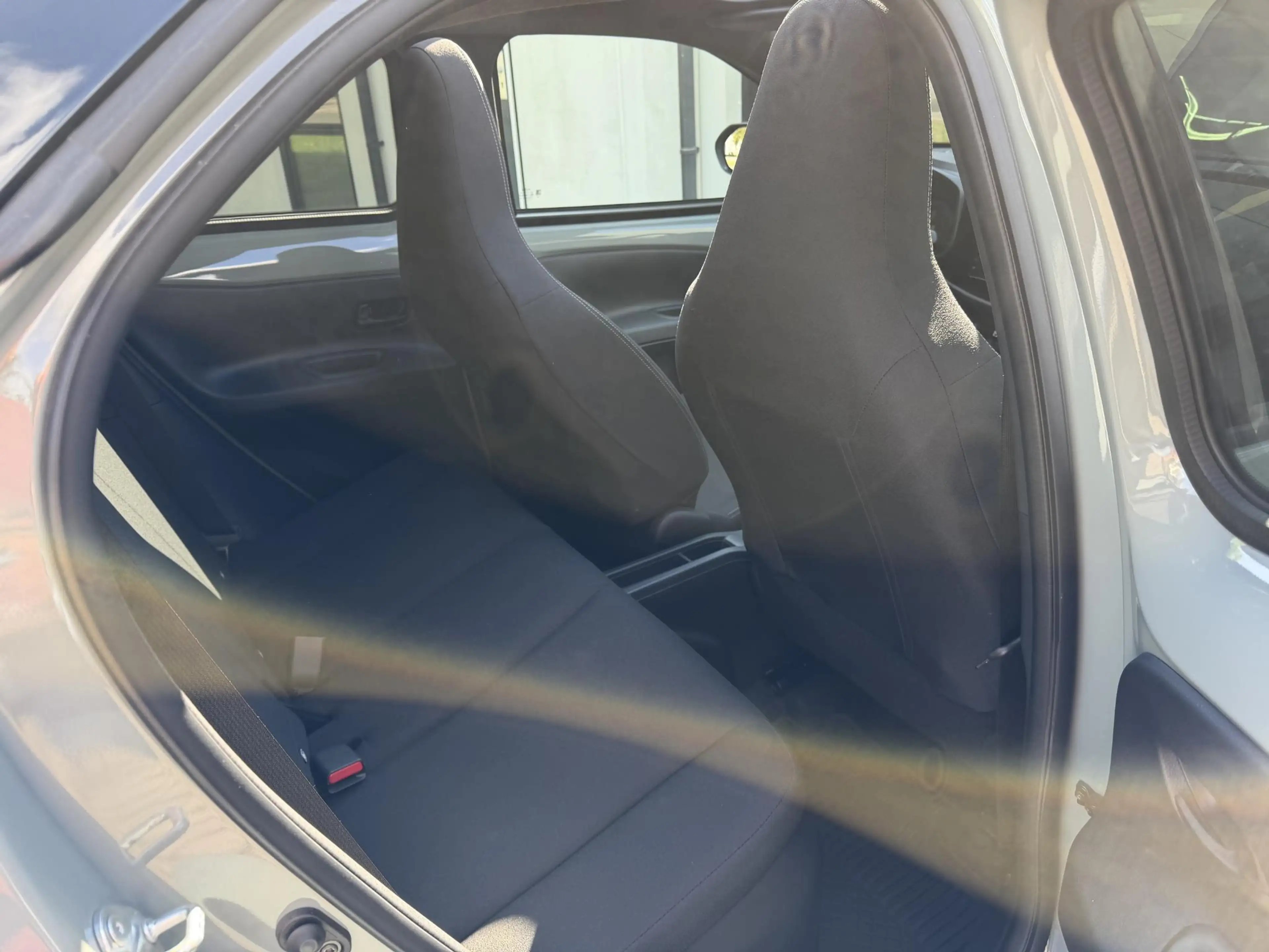 Toyota Aygo X 1.5 VVT-i HEV Pulse e-CVT Elektrisch vouwdak | Cam — photo 18