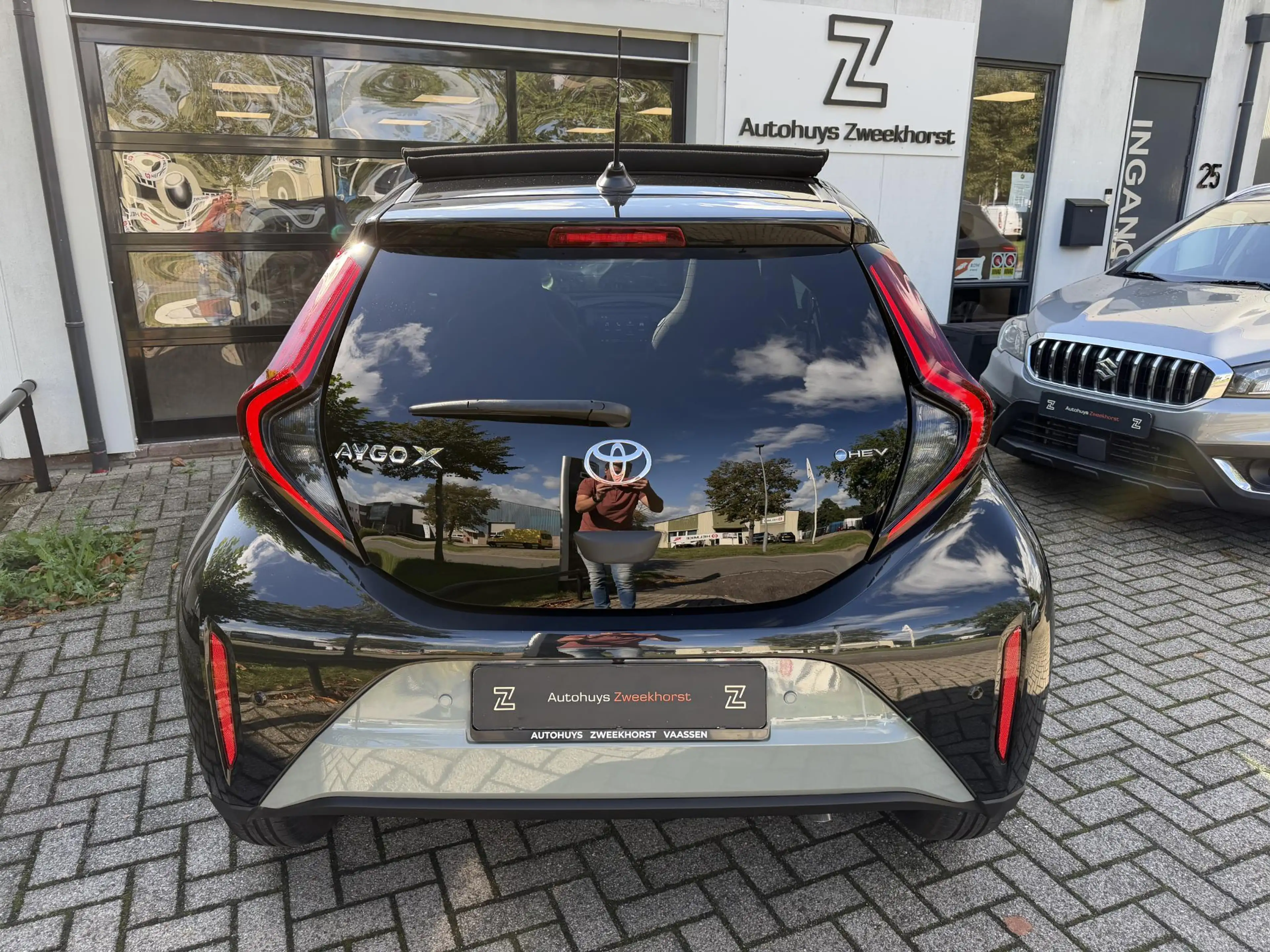 Toyota Aygo X 1.5 VVT-i HEV Pulse e-CVT Elektrisch vouwdak | Cam — photo 7