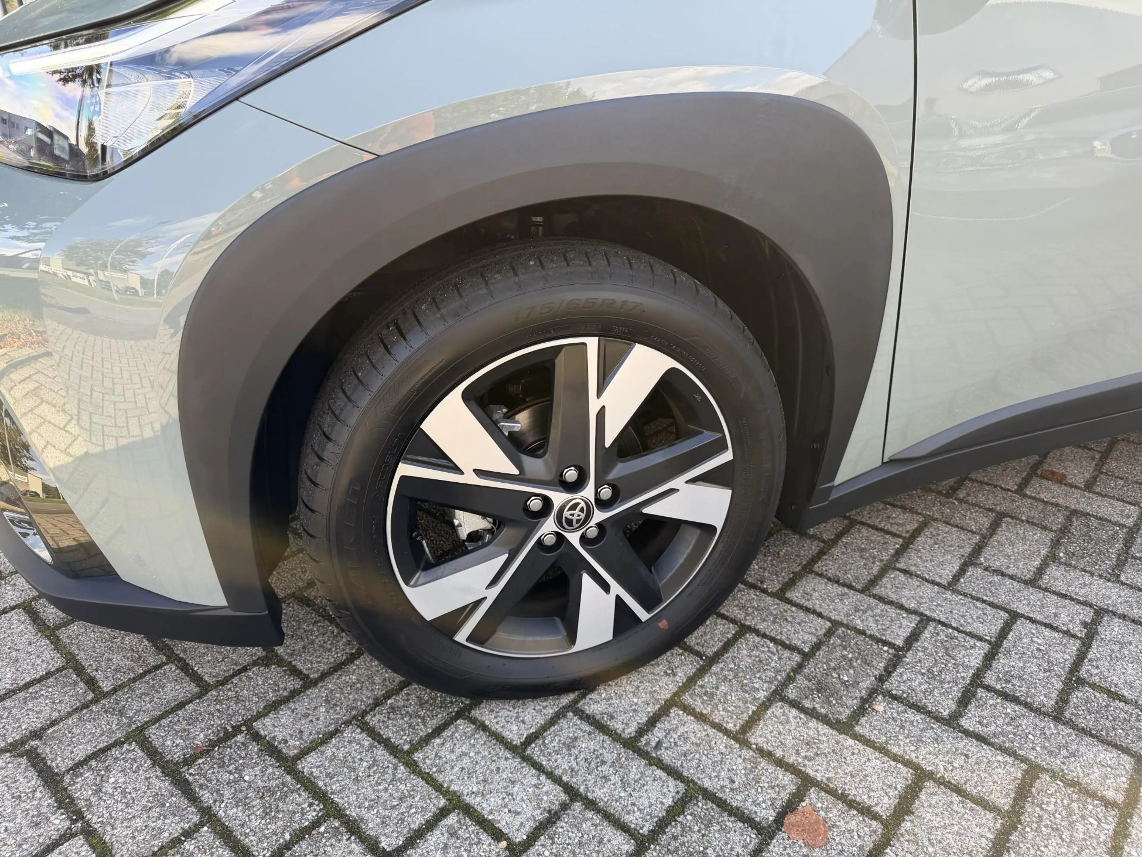 Toyota Aygo X 1.5 VVT-i HEV Pulse e-CVT Elektrisch vouwdak | Cam — photo 21