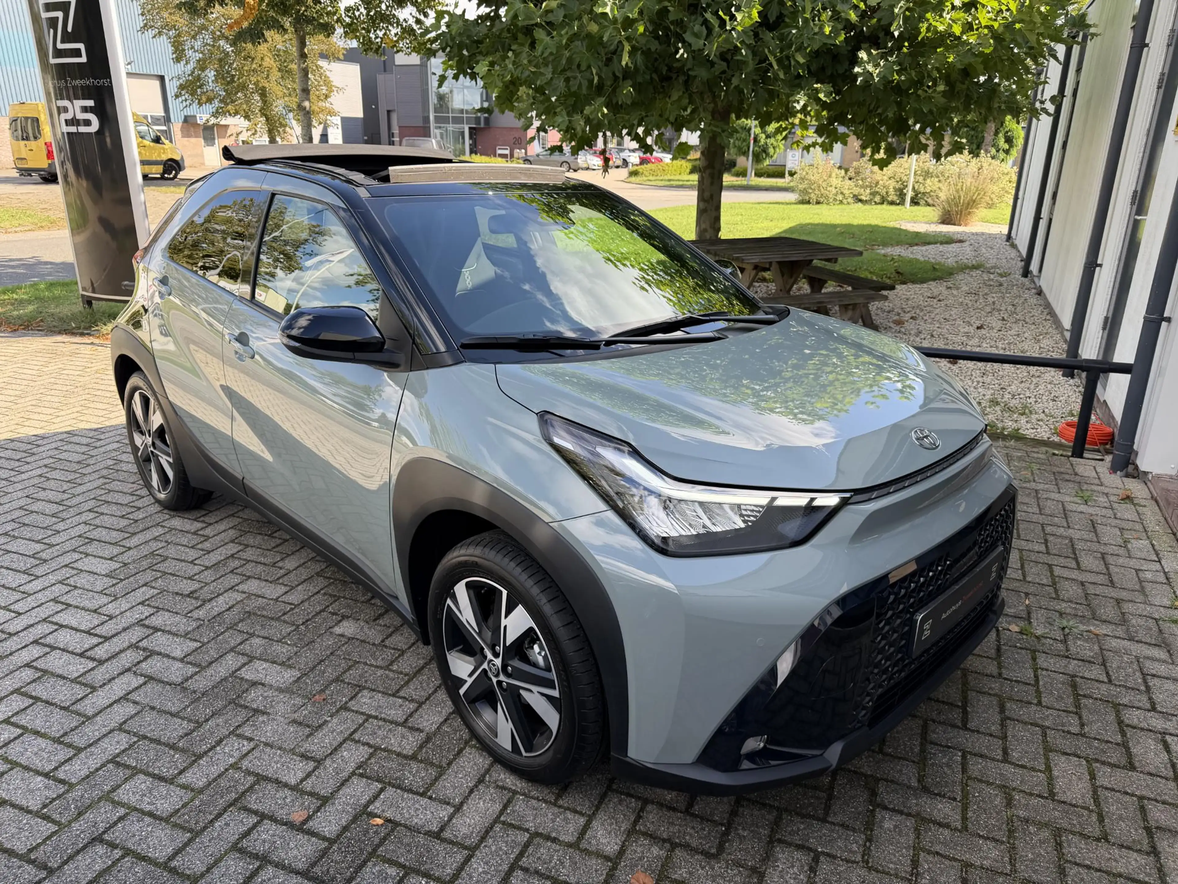 Toyota Aygo X 1.5 VVT-i HEV Pulse e-CVT Elektrisch vouwdak | Cam — photo 17