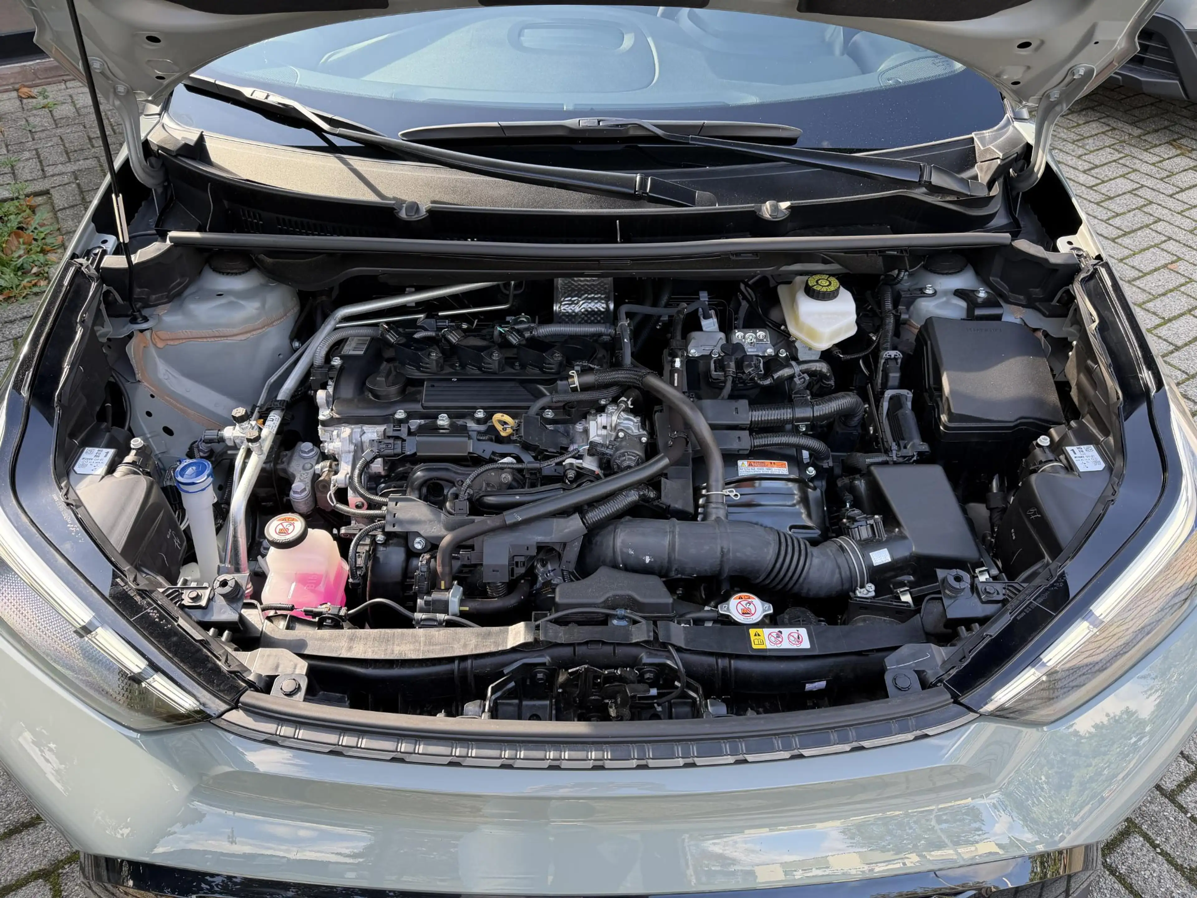 Toyota Aygo X 1.5 VVT-i HEV Pulse e-CVT Elektrisch vouwdak | Cam — photo 9