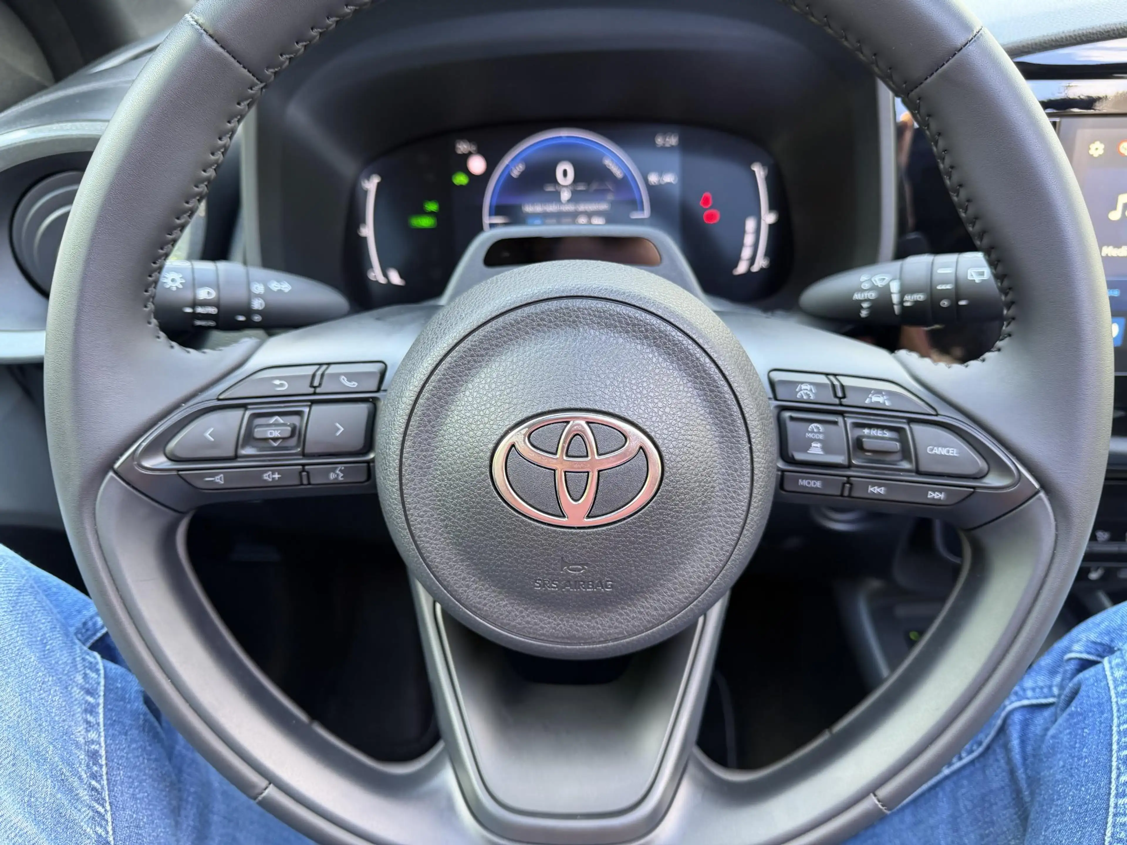 Toyota Aygo X 1.5 VVT-i HEV Pulse e-CVT Elektrisch vouwdak | Cam — photo 16