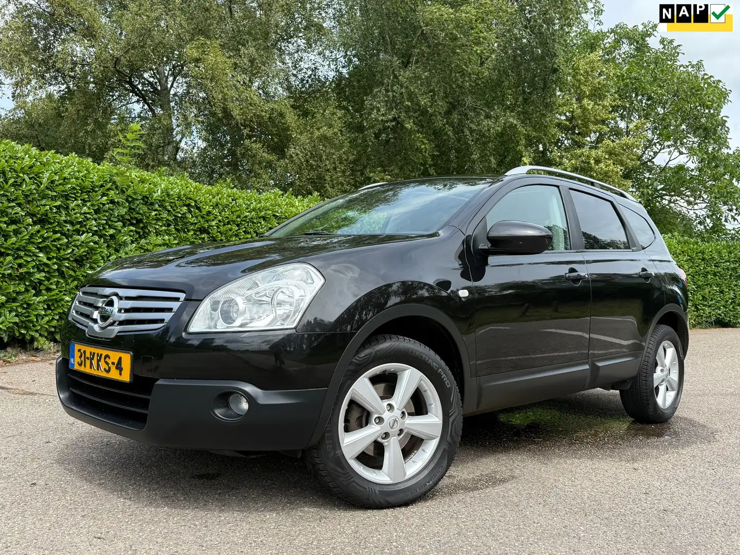 Nissan Qashqai+2 1.6 Optima | 7 Persoons | Panoramadak | Trekhaak | Zwart - 1