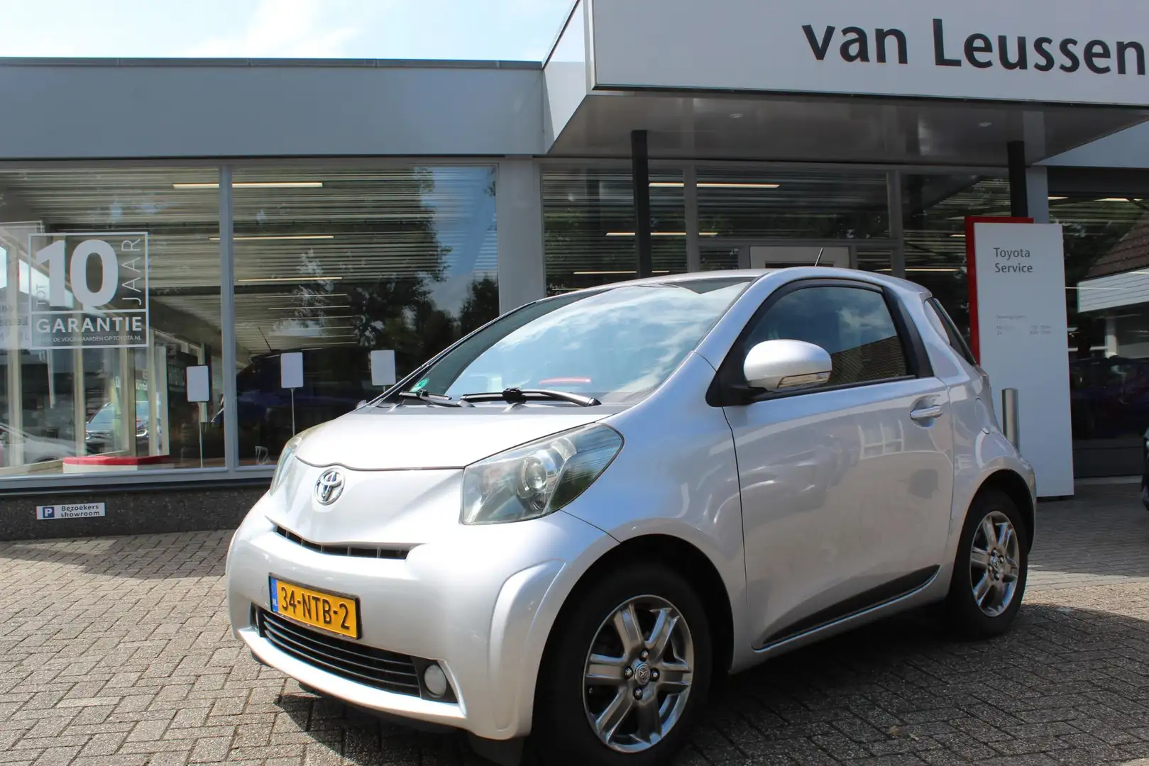 Toyota iQ ASPIRATION JBL CLIMA PARK.SENSOREN STOELVERW.EL-RA Gris - 1