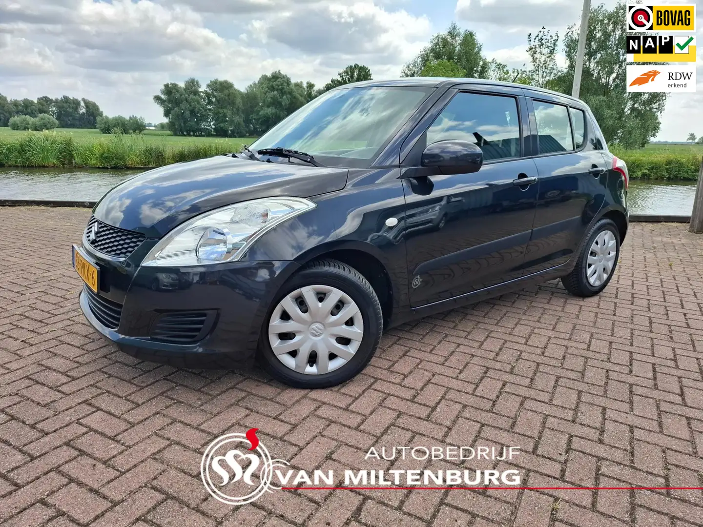 Suzuki Swift 1.2 Comfort EASSS Airco Stoelverw. AllSeason bande Negro - 1