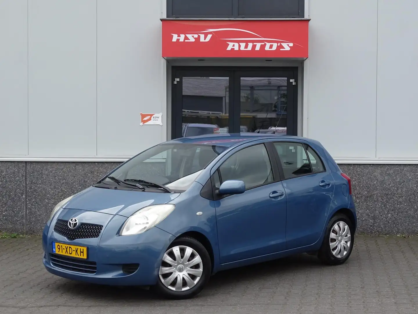 Toyota Yaris 1.3 VVTi Sol airco 4-deurs org NL Grijs - 1