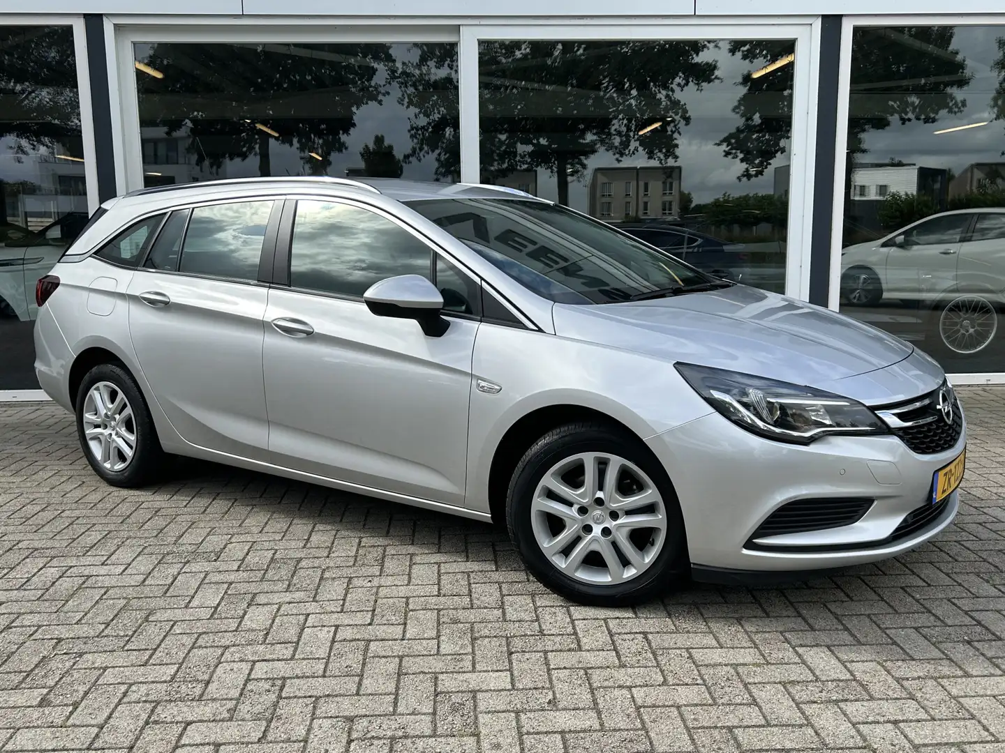 Opel Astra Sports Tourer 1.0 Turbo Business+ 50% deal 4.475,- Grigio - 1