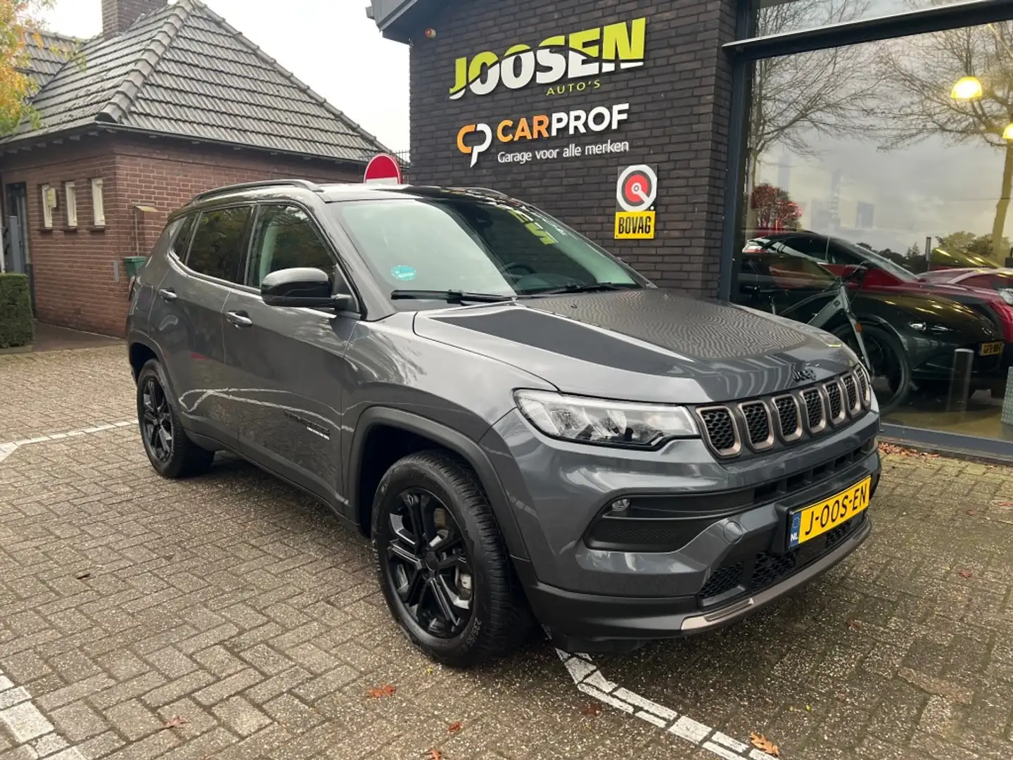 Jeep Compass 4XE 240 HYB. UPLAND Grijs - 1