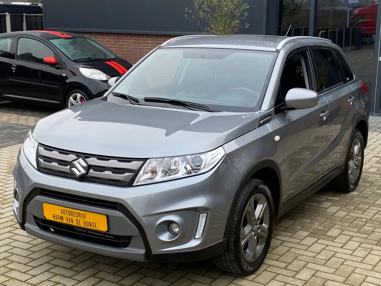 Suzuki Vitara 1.6 High Executive Allgrip NIEUWSTAAT LED XENON CR Grijs - 1