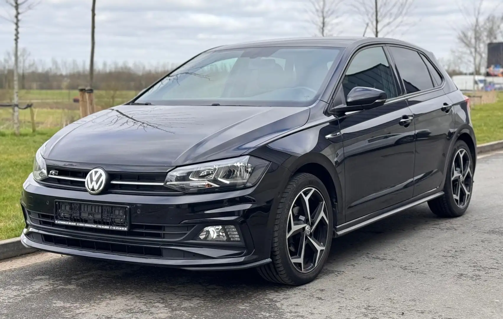 Volkswagen Polo 1.0 TSi R Line NAVI-CARPLAY-CAM-PDC-SERVICEBOOK Zwart - 1