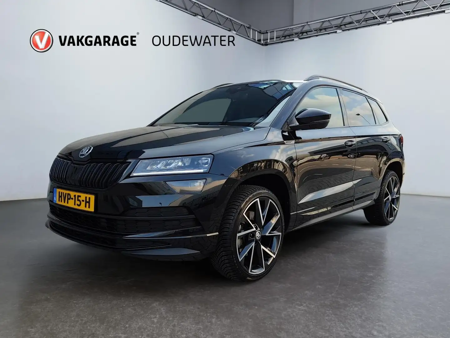 Skoda Karoq 1.5 TSI ACT Sportline Business Zwart - 1