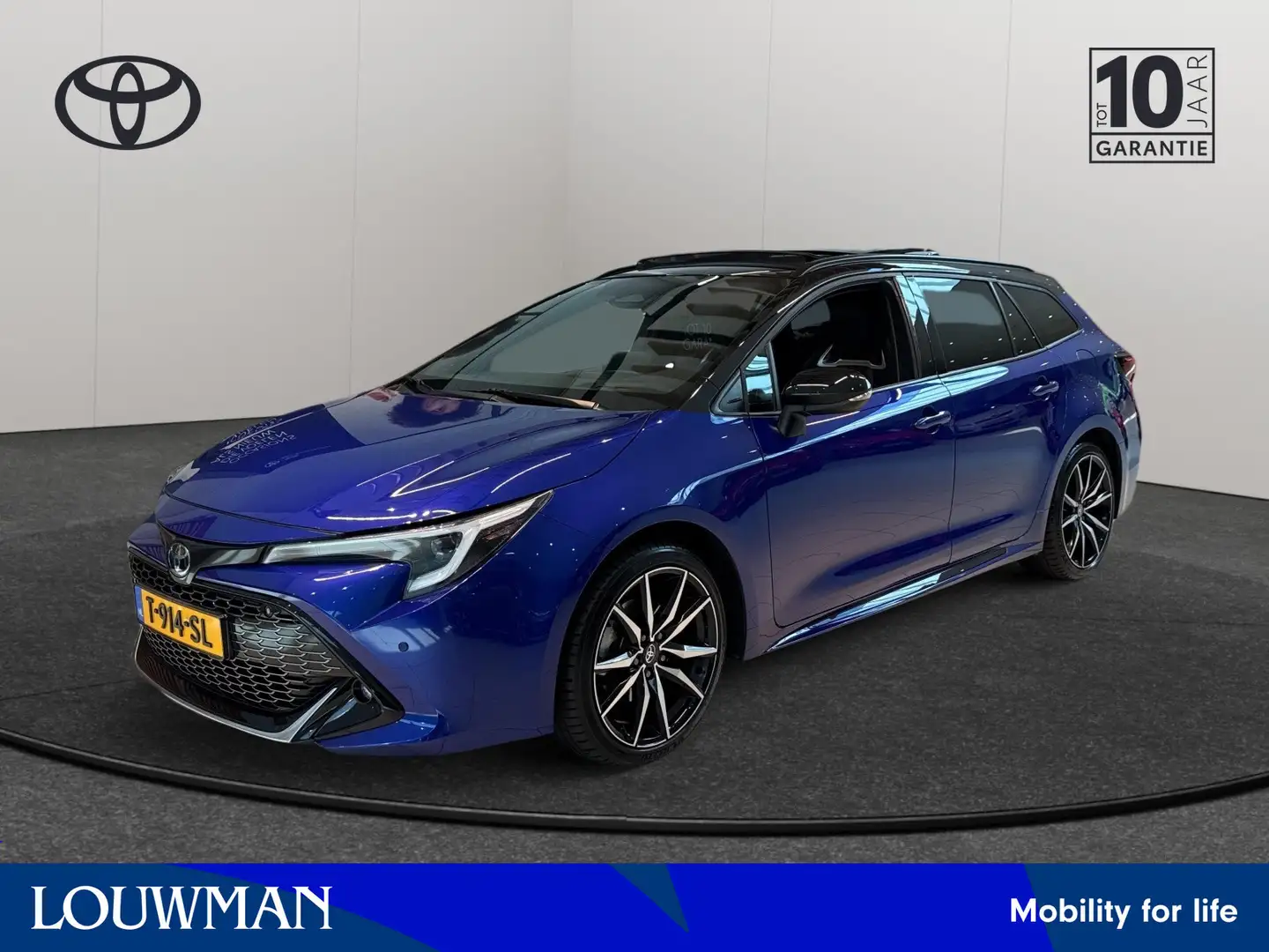 Toyota Corolla Touring Sports Hybrid 200 Business GR Sport Plus | Blauw - 1