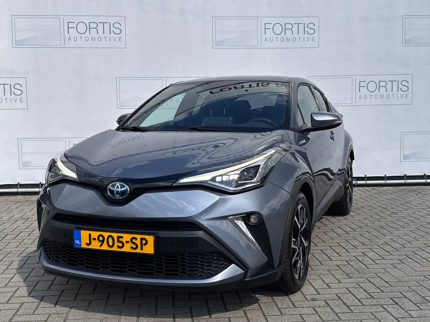Toyota C-HR 2.0 Hybrid First Edition NL AUTO | 1E EIG | CAMERA Grijs - 1