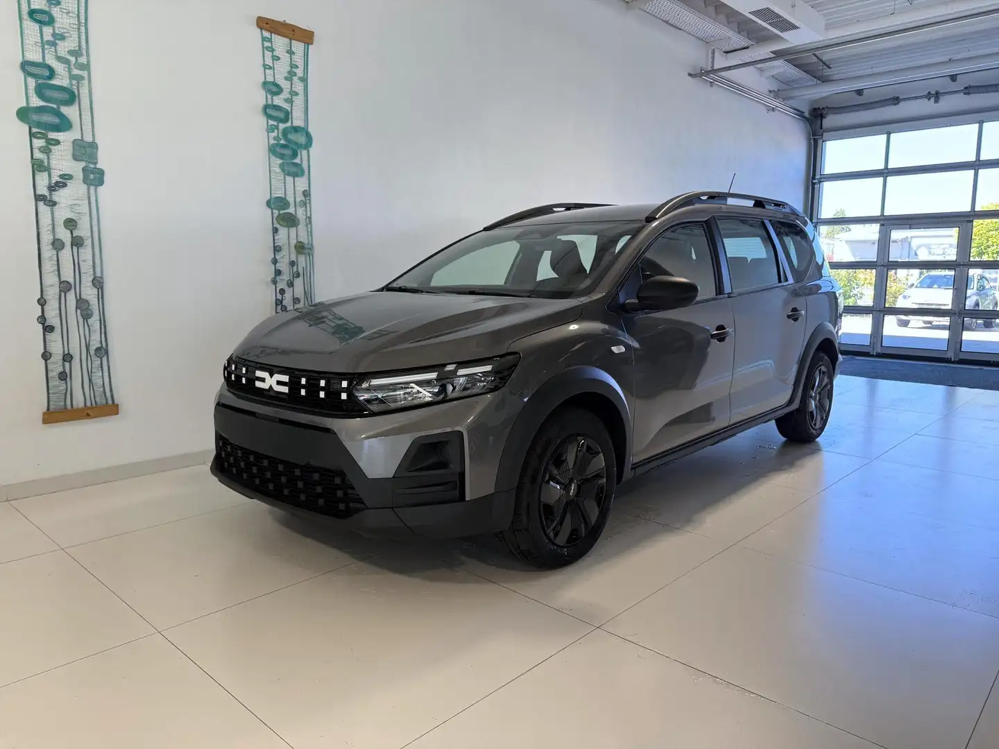 Dacia Jogger 1.2 ECO-G 120 90 KW Benzin / LPG, 7-Sitzer, 6-G... Grau - 1