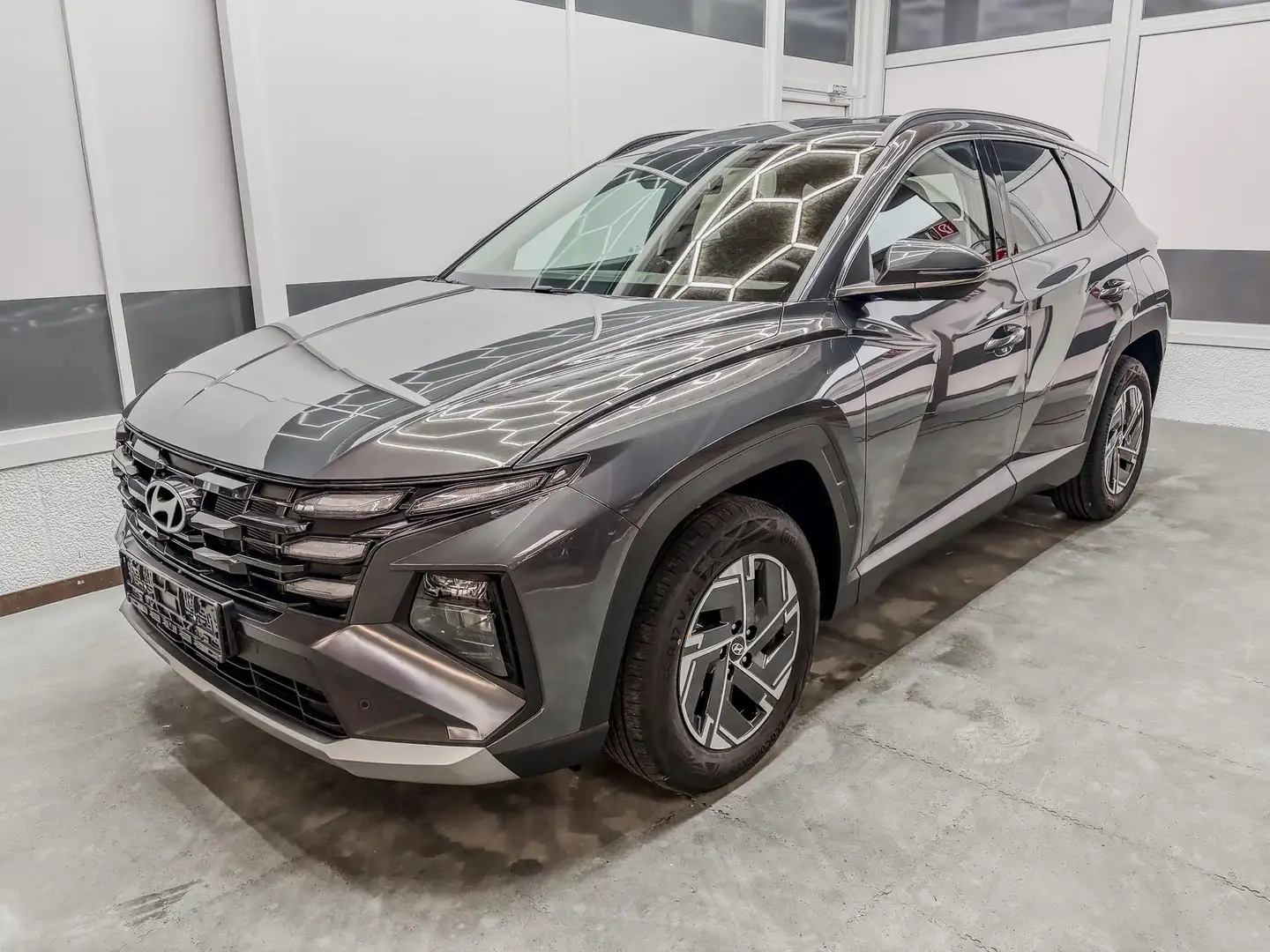 Hyundai TUCSON STYLE AUT KLIMAAUTOMATIK TOTWINKEL NAVI SHZ RFK... Grau - 1