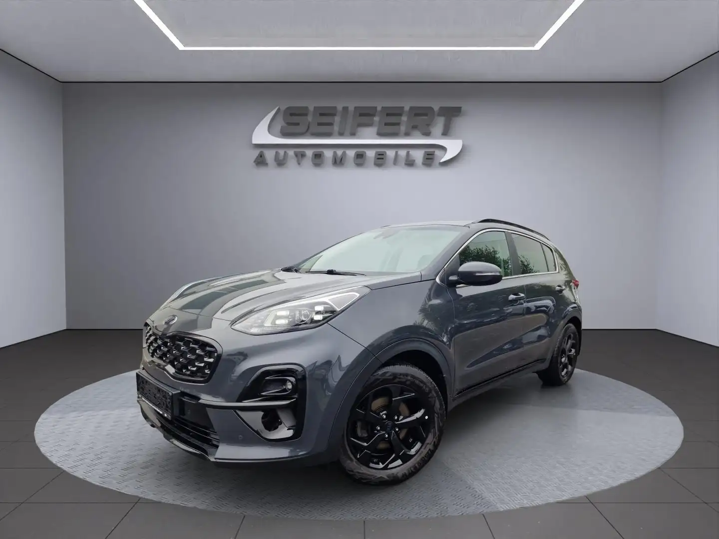 Kia Sportage I BLACK EDITION I 4WD I AHK I LEDER I NAVI I Grijs - 1