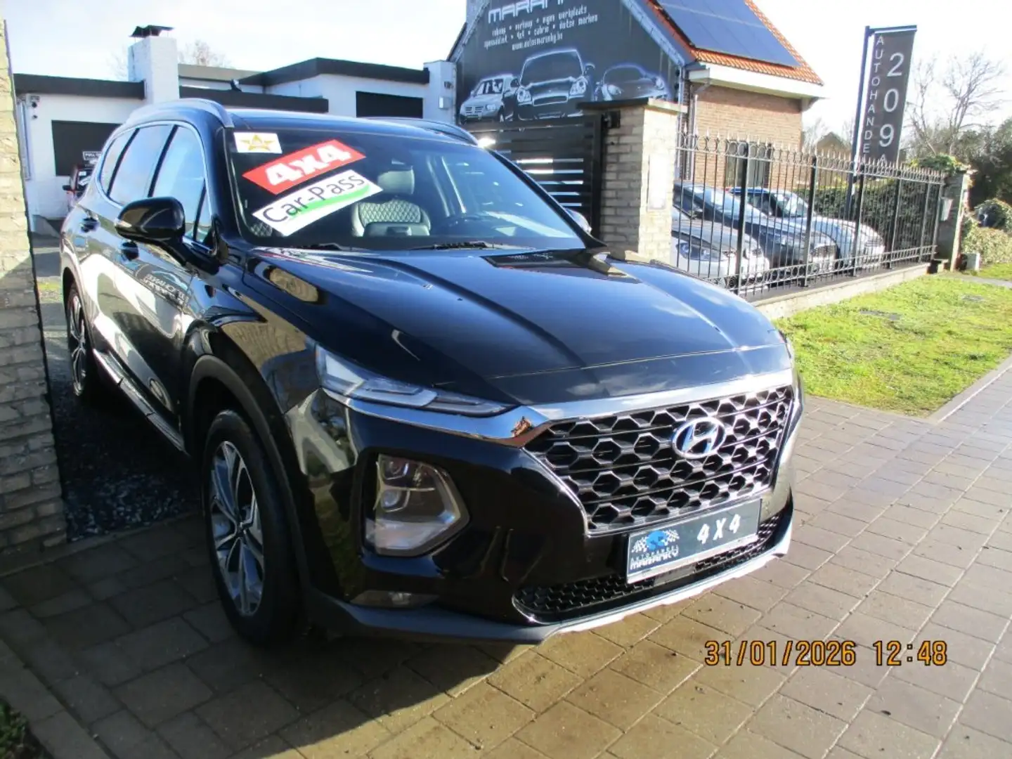 Hyundai SANTA FE 2.0CRDI 150PK PREMIUM HTRAC 7PL FULL OPTION EURO6e Schwarz - 1