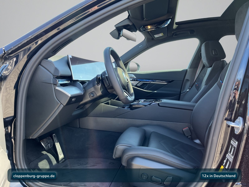 BMW 550 e xDrive Touring — photo 12