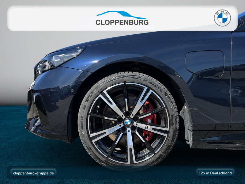BMW 550 e xDrive Touring — photo 10