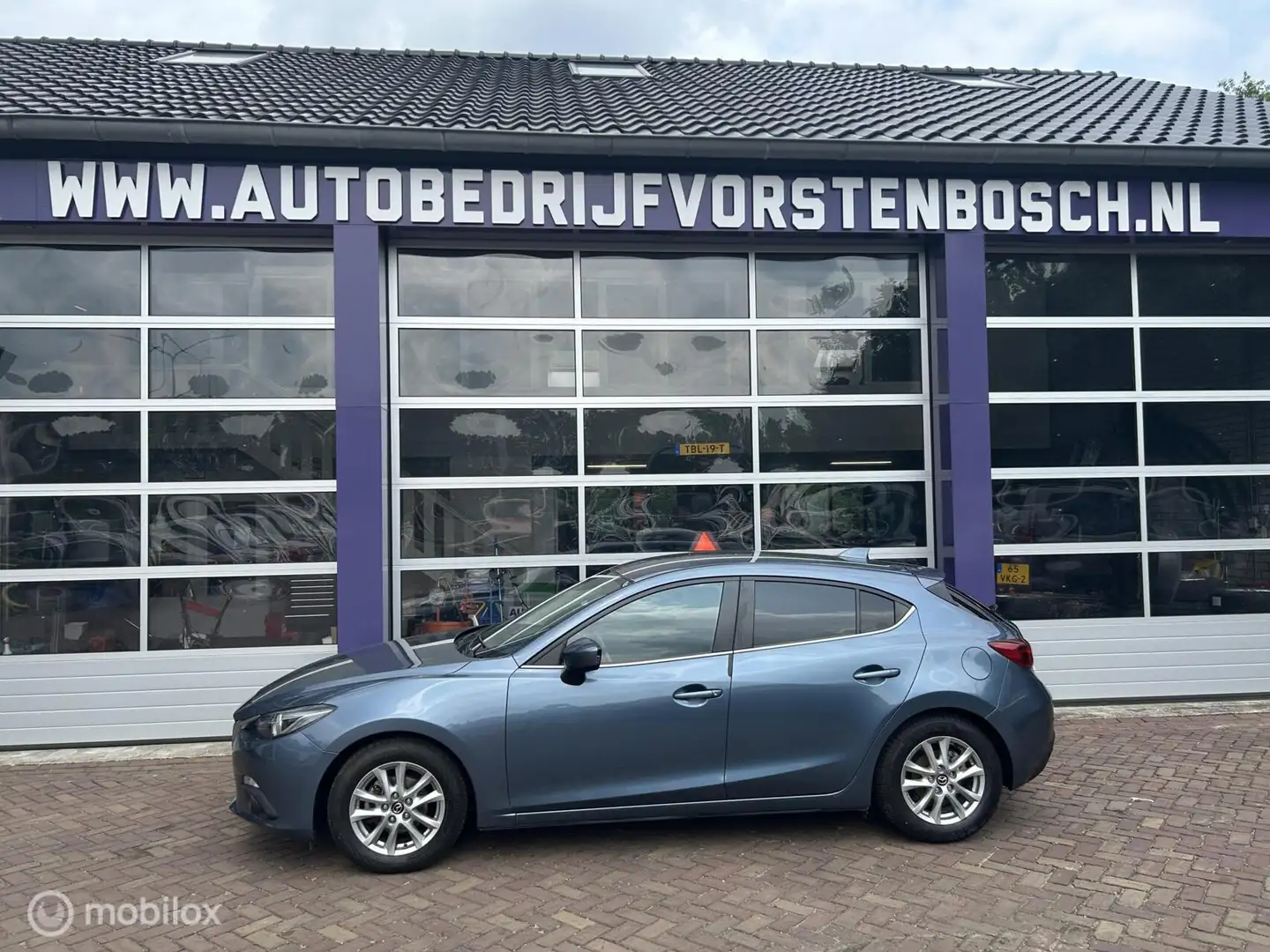Mazda 3 1.5 S * AIRCO * NAVIGATIE * TREKHAAK * LM VELGEN * Blauw - 2
