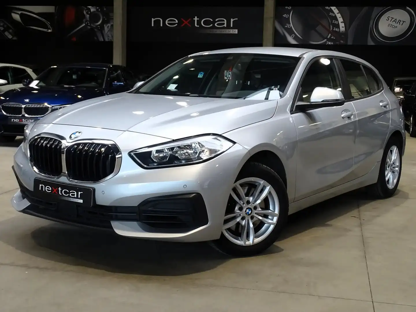 BMW 118 i Hatch New ***NAVI PRO-PARKING-CRUISE*** Zilver - 1