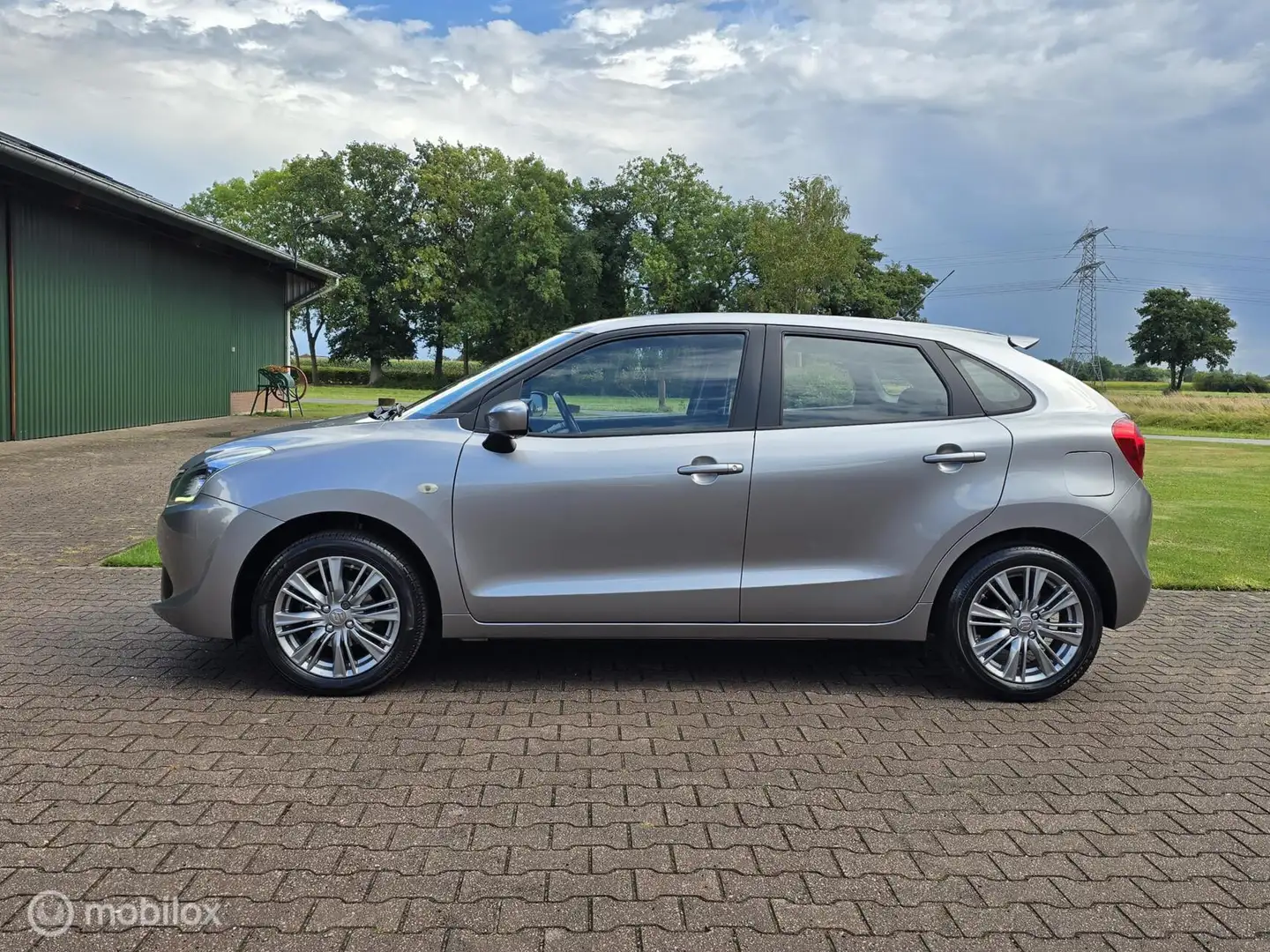 Suzuki Baleno 1.2 Exclusive/CRUISE/AIRCO/XENON/TREKHAAK Grijs - 2
