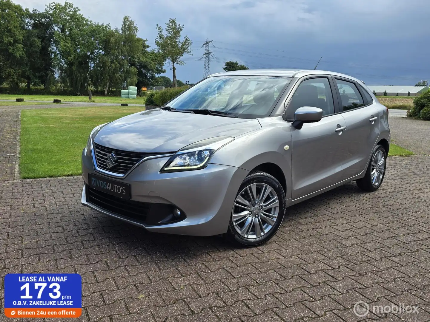 Suzuki Baleno 1.2 Exclusive/CRUISE/AIRCO/XENON/TREKHAAK Grijs - 1