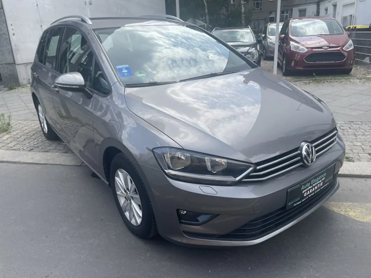 Volkswagen Golf VII Sportsvan1,4 TSI BTM DSG "COMFORTLINE" 1.HAND, Grigio - 1