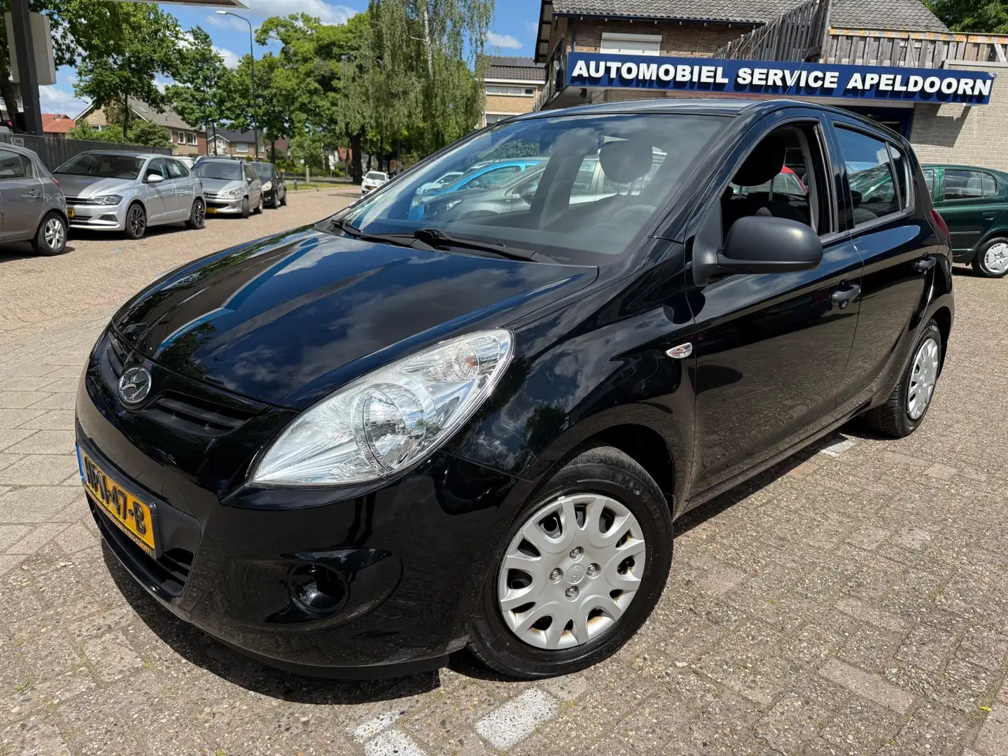 Hyundai i20 1.2i i-Drive *AIRCO*ELEKTR. RAMEN*5DRS*STUURBEKR.* Schwarz - 1