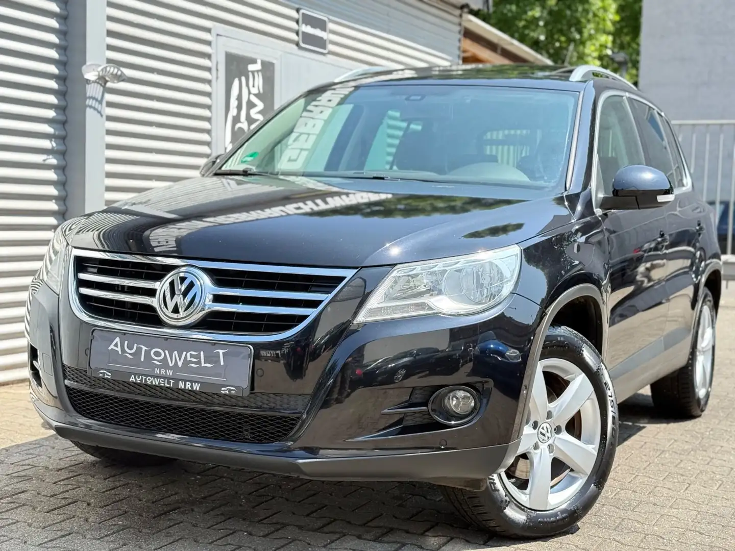 Volkswagen Tiguan 2.0TDI Sport & Style 4Motion *DSG* Zwart - 1