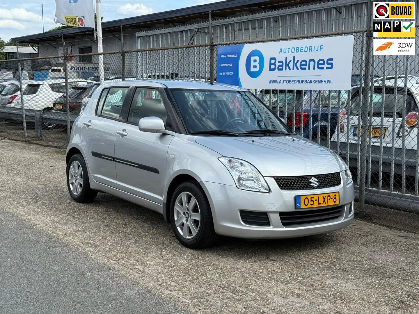 Suzuki Swift 1.3 Cool | Airco | 1e eigenaar | NAP Grijs - 1
