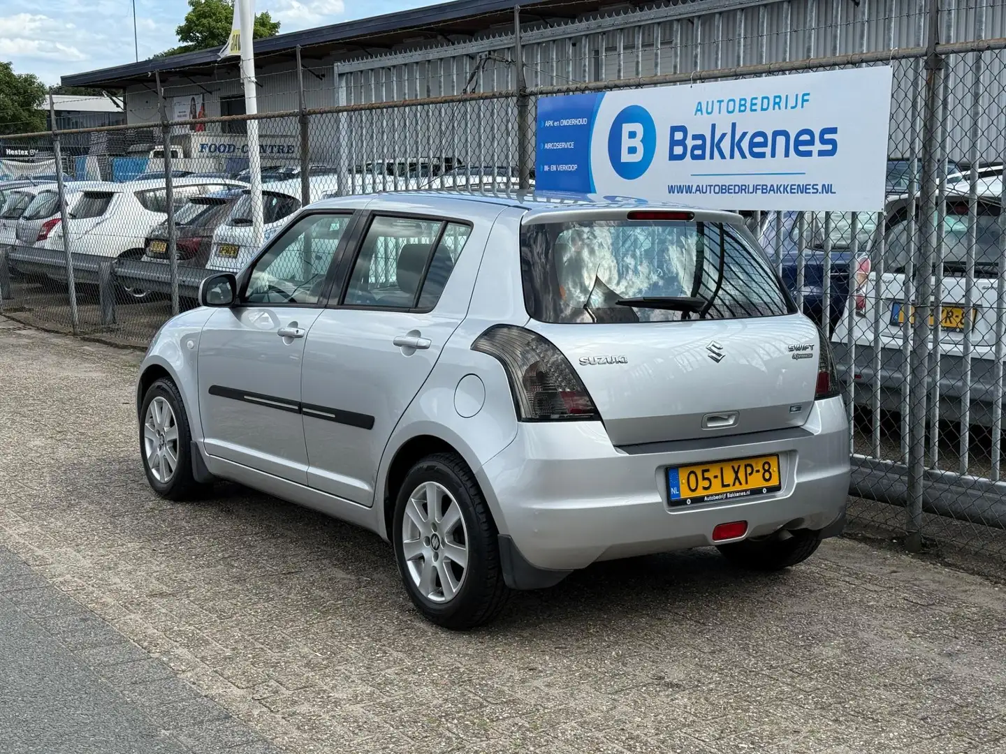 Suzuki Swift 1.3 Cool | Airco | 1e eigenaar | NAP Grijs - 2